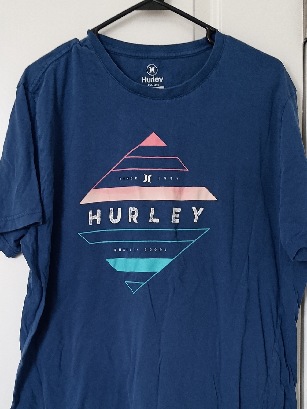 Hurley Blue Short Sleeve Graphic Tee with Pink & Teal Accents